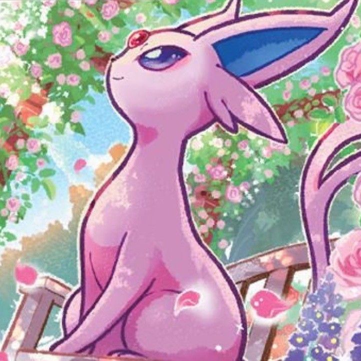 image of espeon sitting amongst some roses. it is a cropped pokemon card.
